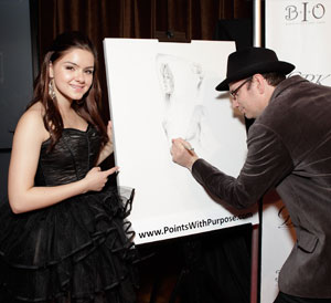 David placesa dot for Ariel